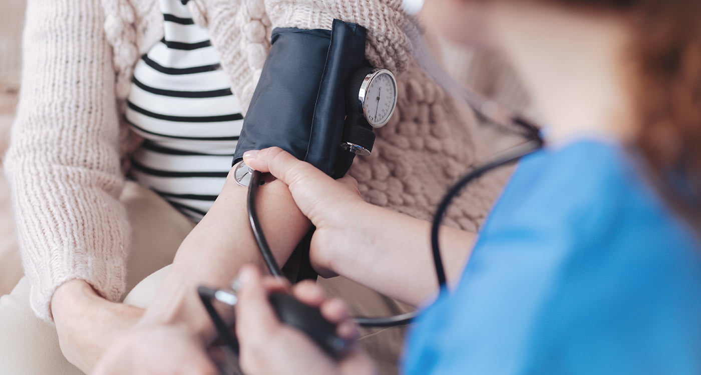 a person getting their blood pressure taken