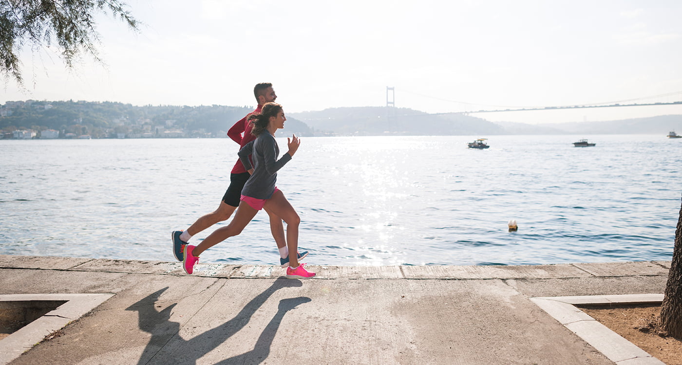 a man and a lady running